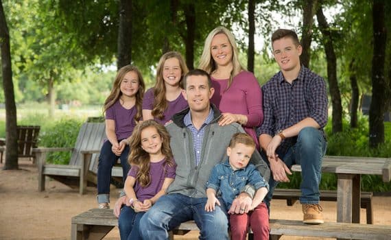 Kacey Hester and his wife Darla and their five children after he recovered from testicular cancer at Methodist Dallas.