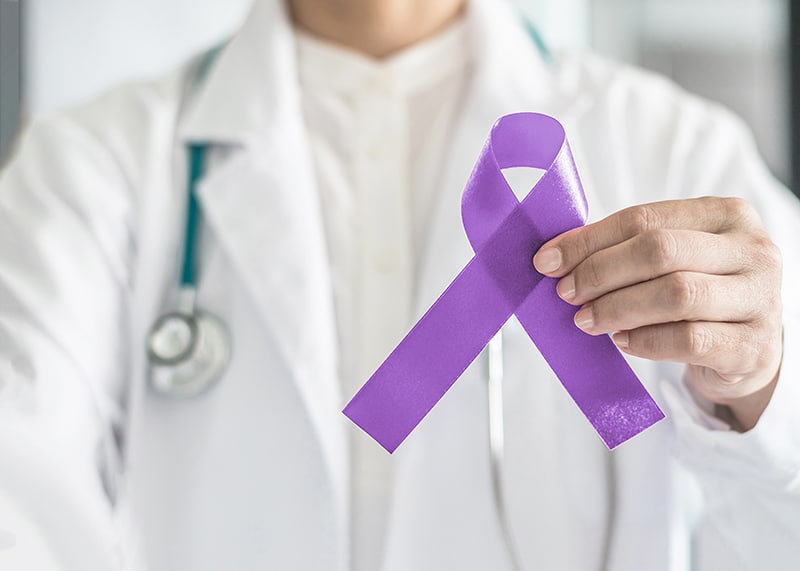 Purple ribbon for pancreatic awareness. Now there are new technologies for treating this disease.
