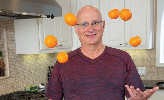 Tracy Edwards juggles oranges after his weight-loss surgery.