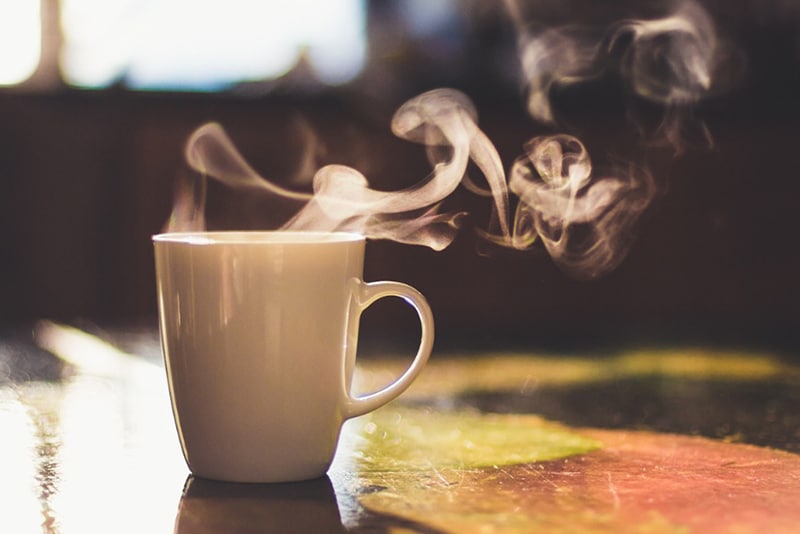 tea mug steeping; try floral teas for health benefits