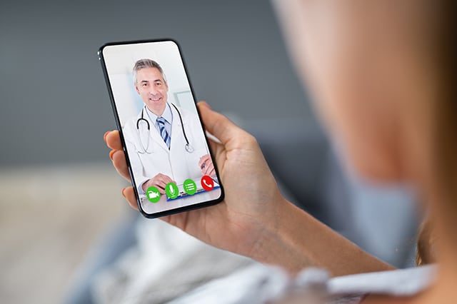 Person Videochatting With Doctor