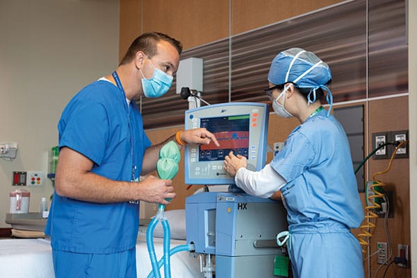 Lucas Friedel, BSRC, RRT-NPS, director of respiratory therapy at Methodist Mansfield Medical Center and Yan Lin, RRT