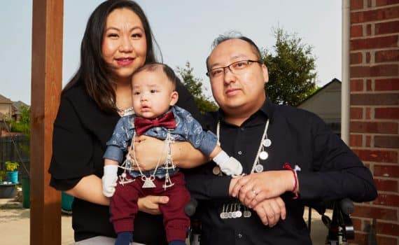 Mor Xiong and husband Culeng photographed with their new son, Theodore, after Mor's difficult pregnancy