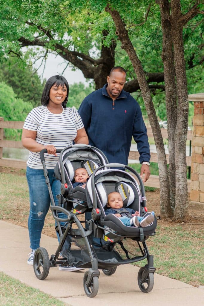 Ashley and Mario Donnell, pushing their twins Malik and Miles in a stroller