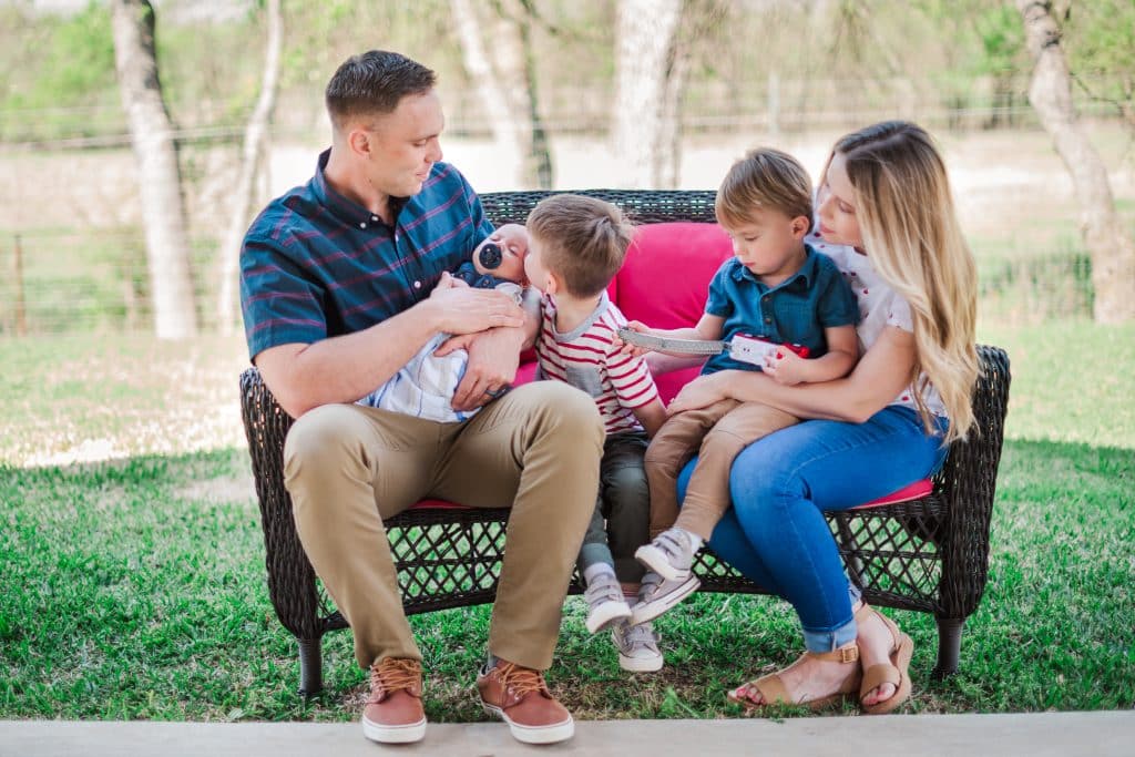 Haley and Zach Stewart with their three children after Haley gave birth to the first newborn delivered at Methodist Midlothian Medical Center