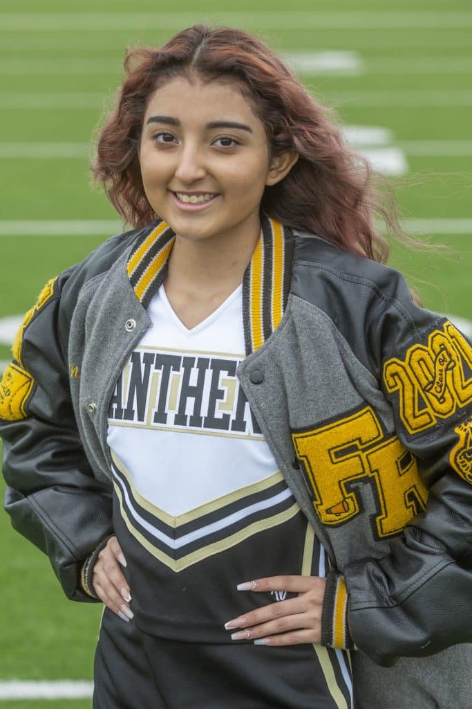 Cheerleader Nadia Gomez in her cheerleading uniform after her liver transplant