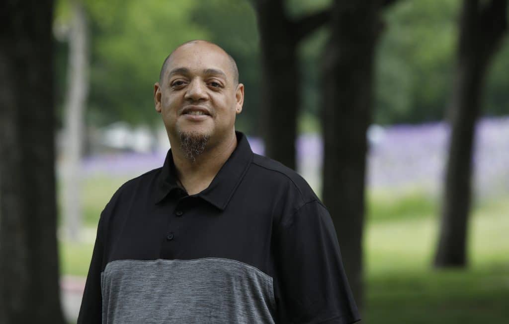 Daniel Lauriano smiling at the camera, photographed after his widow maker heart attack