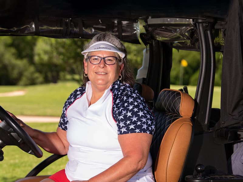 Mimi Leasor of Mansfield photographed in a golf cart after her widow maker heart attack, a condition that affects men and women