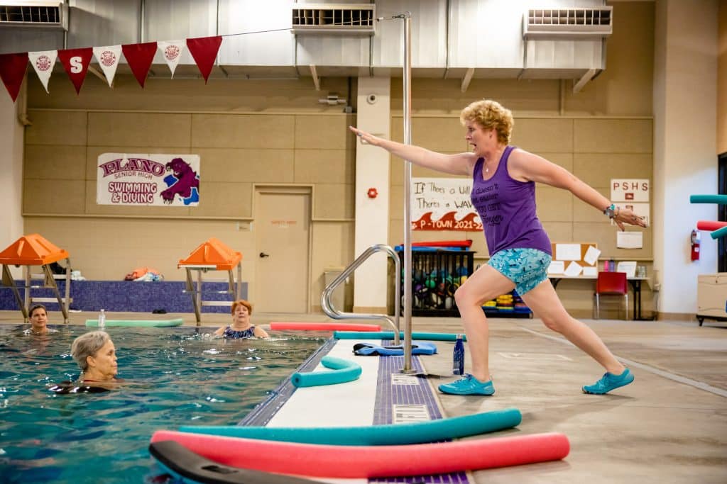 Erika Burkhardt photographed teaching a water fitness class after breast cancer