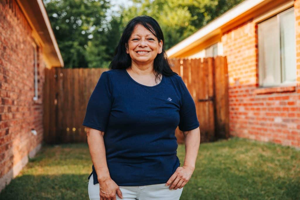 Alice Chapa photographed in a backyard