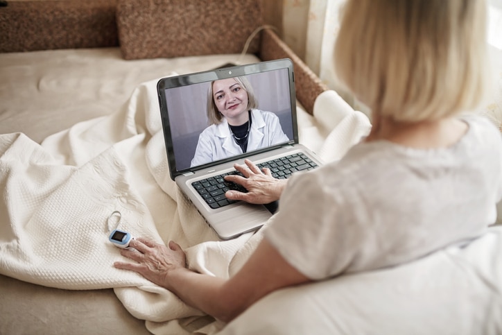 A photo of a patient visiting a physician via virtual care