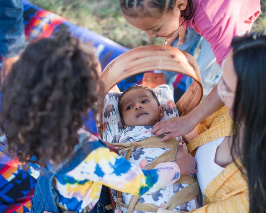 Baby Jaden in a transition Navajo baby carrier