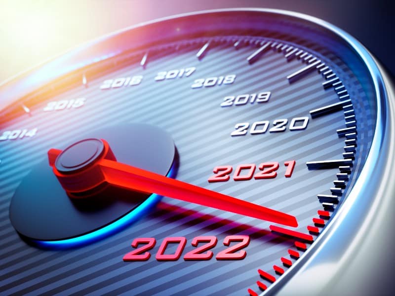 Speedometer pointed to a fictional measurement of 2022, used to explain boosting metabolism with diet and exercise