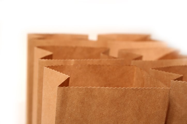 A group of open paper bags in two rows of three