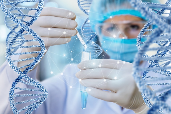 Stock image of a medical research professional with a test tube imposed with DNA strands