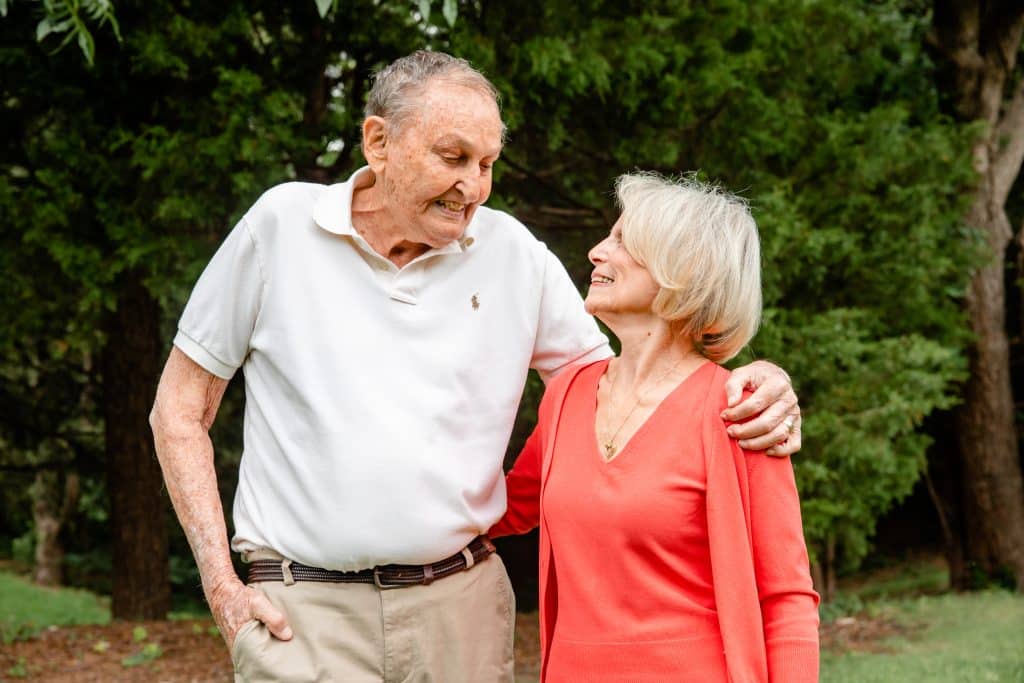 Pearl and Vernon Smith smiling and looking fondly at each other