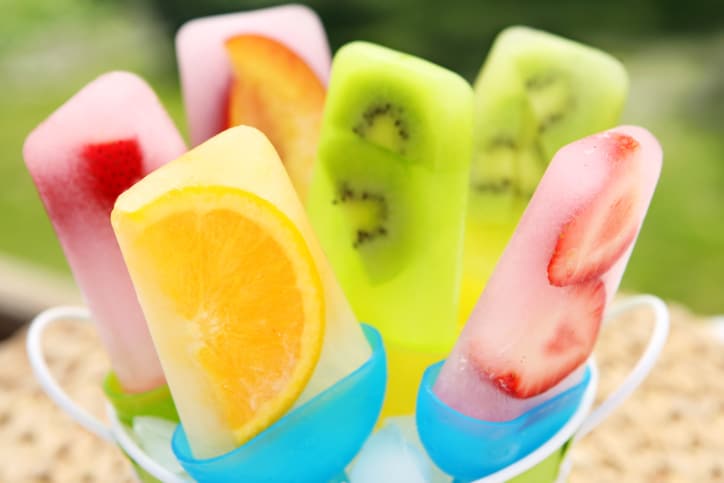 A photograph of fruit popsicles, a healthy summer snack