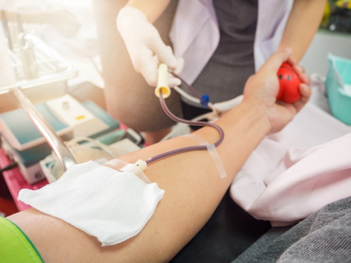 A stock image of a person having blood drawn