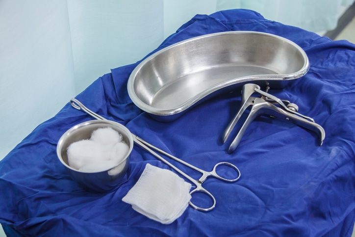 An image of medical supplies on a table with blue lining on top