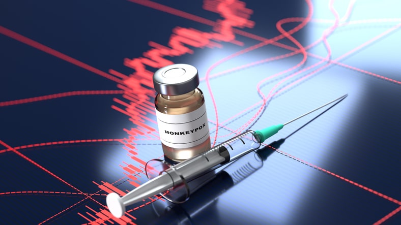 A cartoon stock image of a monkeypox vaccination vial and a needle