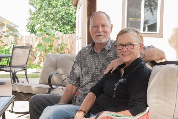 David Fast photographed sitting next to his wife Karen