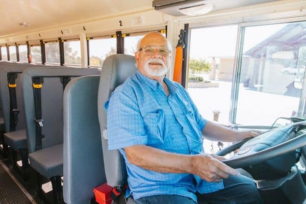 Robert Richards in the front seat of a school bus after his procedure at the Methodist Midlothian cath lab