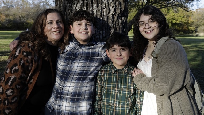 Stephanie Subia after her stroke photographed with her three children