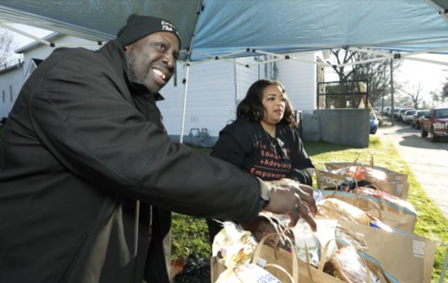 Tammy and Leonard hold a food drive for the nonprofit Empowering the Masses.