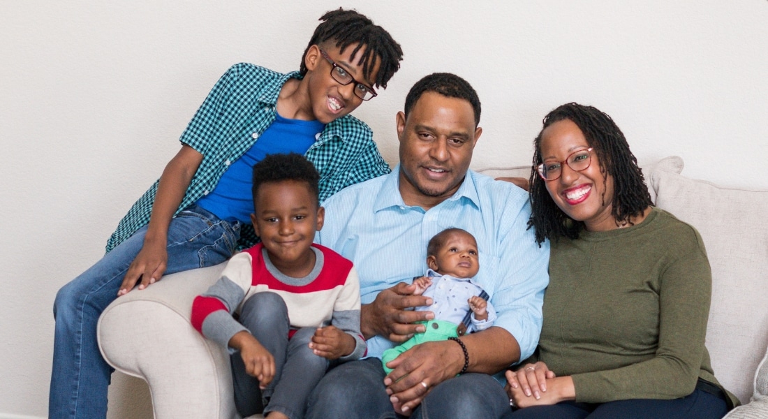 Nyadia Thorpe with her newborn, Caris, husband, Jeff, and sons Caden, 10, and Caius, 4