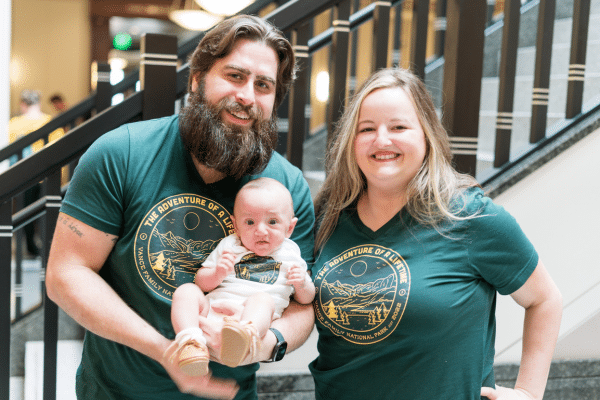 Stephanie and Brett Vance photographed with baby PJ at the courthouse