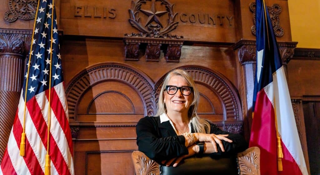 Judge Cindy Ermatinger stands in her courtroom at the Ellis County Courthouse.