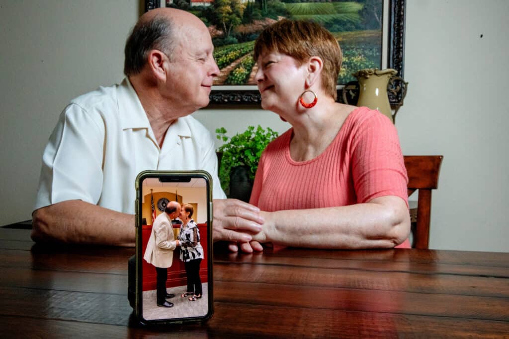 Patty and Ron Spurgeon photographed smiling and looking at each other, used to explain how they met after bypass surgeries and rehab