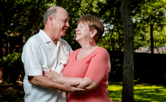 Patty and Ron Spurgeon photographed smiling and looking at each other, used to explain how they met after bypass surgeries and rehab