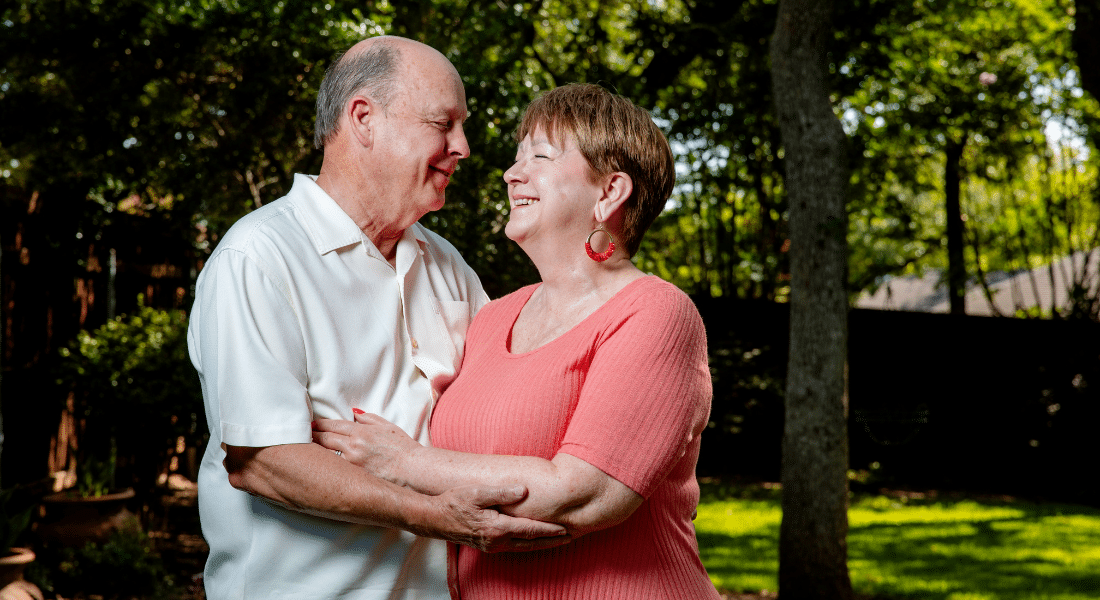 Patty and Ron Spurgeon photographed smiling and looking at each other, used to explain how they met after bypass surgeries and rehab
