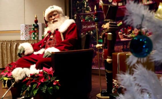 Thomas McDonald, dressed as Santa, visits Methodist Dallas to spread cheer among the staff who saved his wife.