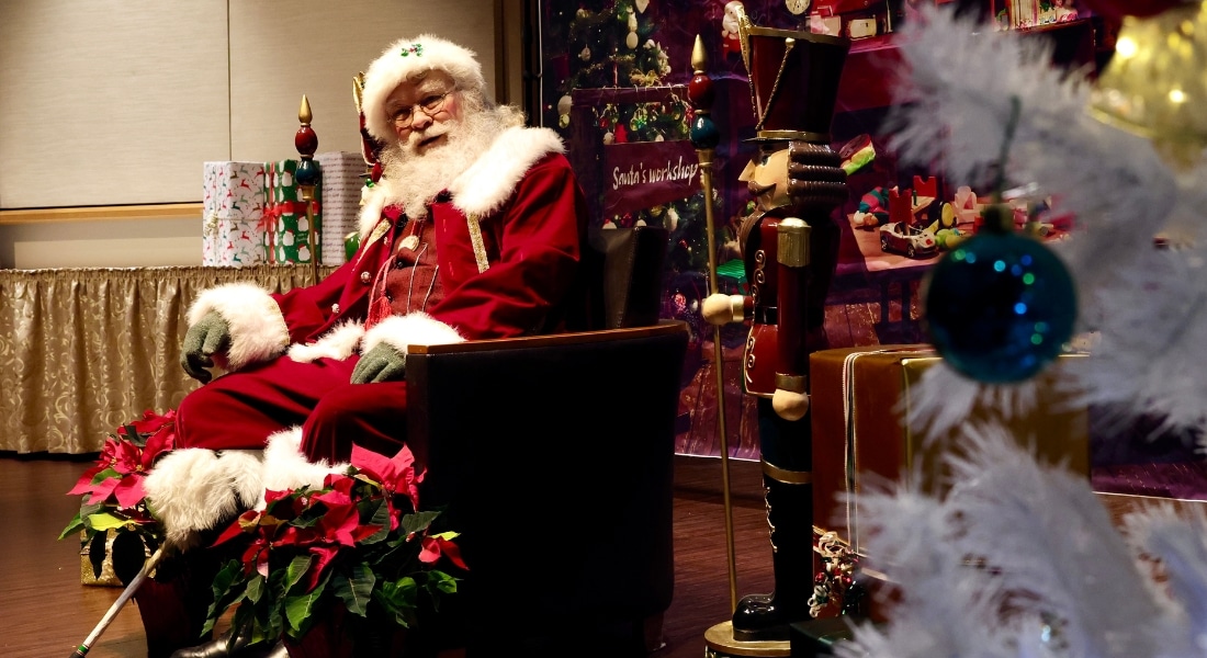 Thomas McDonald, dressed as Santa, visits Methodist Dallas to spread cheer among the staff who saved his wife.