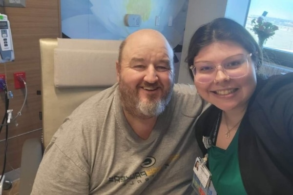 Tater and Patient Care Technician Gabrielle Marquez take a selfie at Methodist Midlothian.