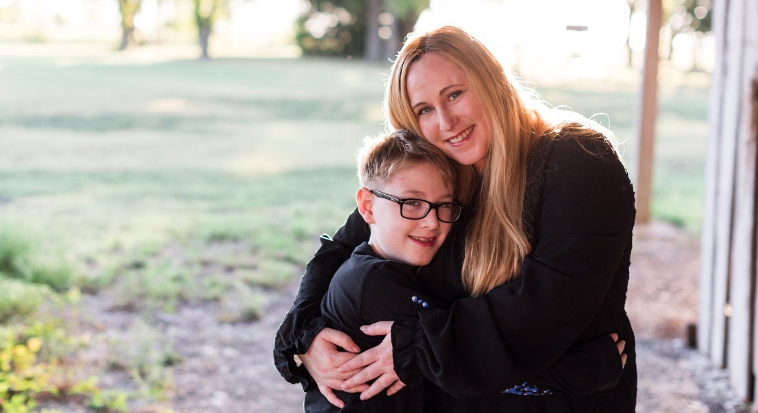 Brayden and Moira Montgomery share a hug