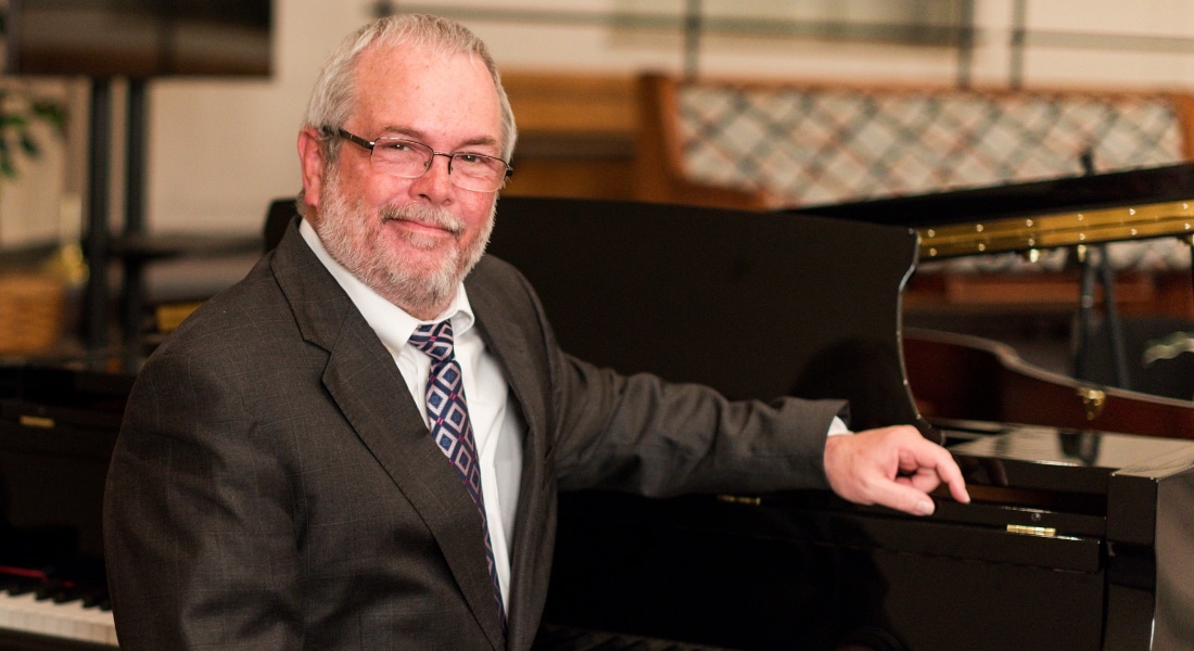 Cancer survivor Paul King plays piano at his DeSoto church