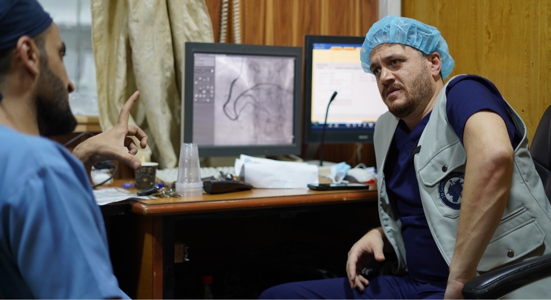 Anas Alomar, MD, in a medical office in Syria to help refugees with medical care