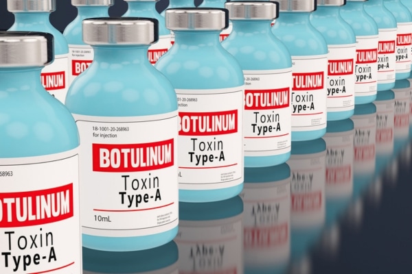 Bottles of botulinum toxin are lined up.