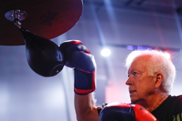 Heart patient Steven Pratt practices on a speed bag at his boxing gym.