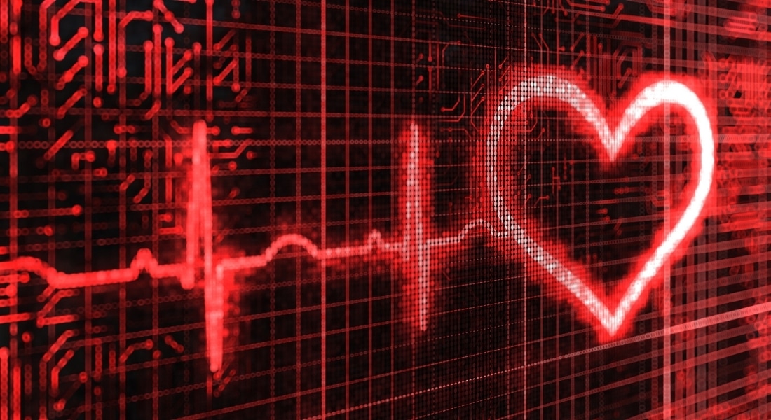 A digitized EKG that ends in a stylized image of a heart.