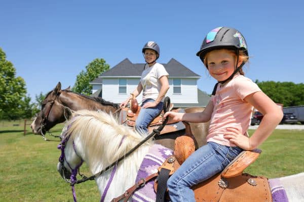 Brooke Jayo rides horses with her 6-year-old daughter, Harper.