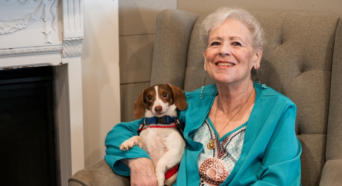 Sharron Mirikitani and her dog Patches at her home