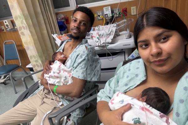 Maria Burns and her husband, Antonio, hold their baby boys in the NICU at Methodist Dallas.