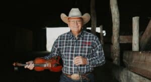 After gallbladder attack, Reba’s big brother Pake fit to fiddle again