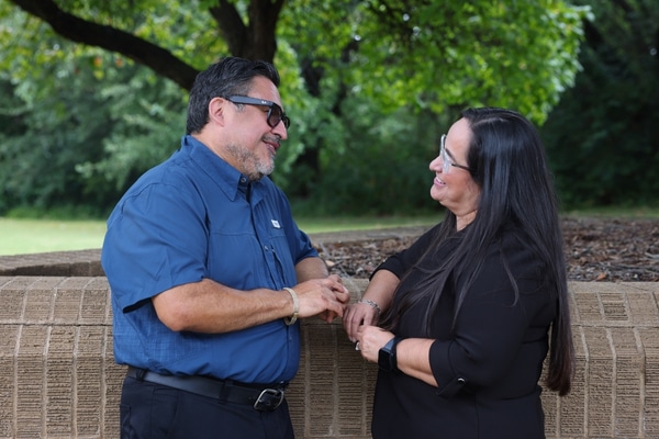 Stroke patient Cynthia Granados talks to her husband, Juan, who was treated for Bell’s palsy.
