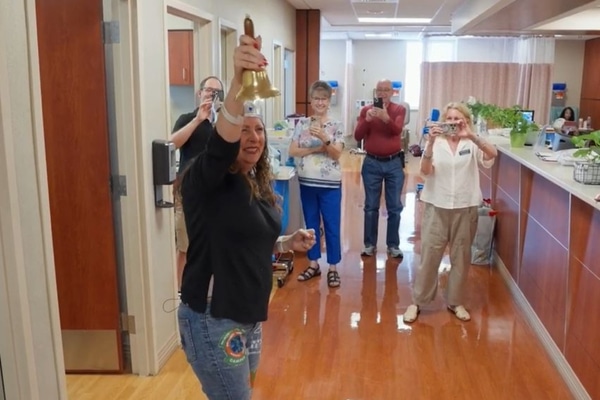 Sheila Elliott rings the bell signifying her last chemo treatment