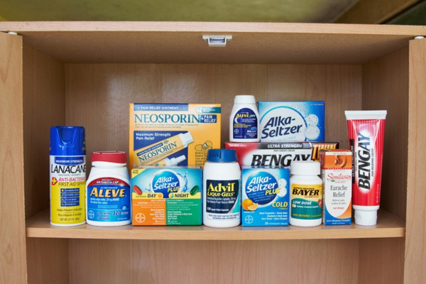 A medicine cabinet contains various over-the-counter drugs.